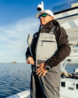 Breakwater Wader in Tempest — adjusting the harness on deck