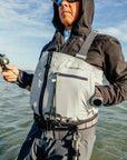 Breakwater Wader in Tempest with the Windward Thermal Hoody, wading the flats