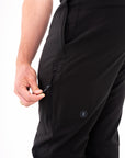 Windward Thermal Pant in Black — zippered side pocket detail