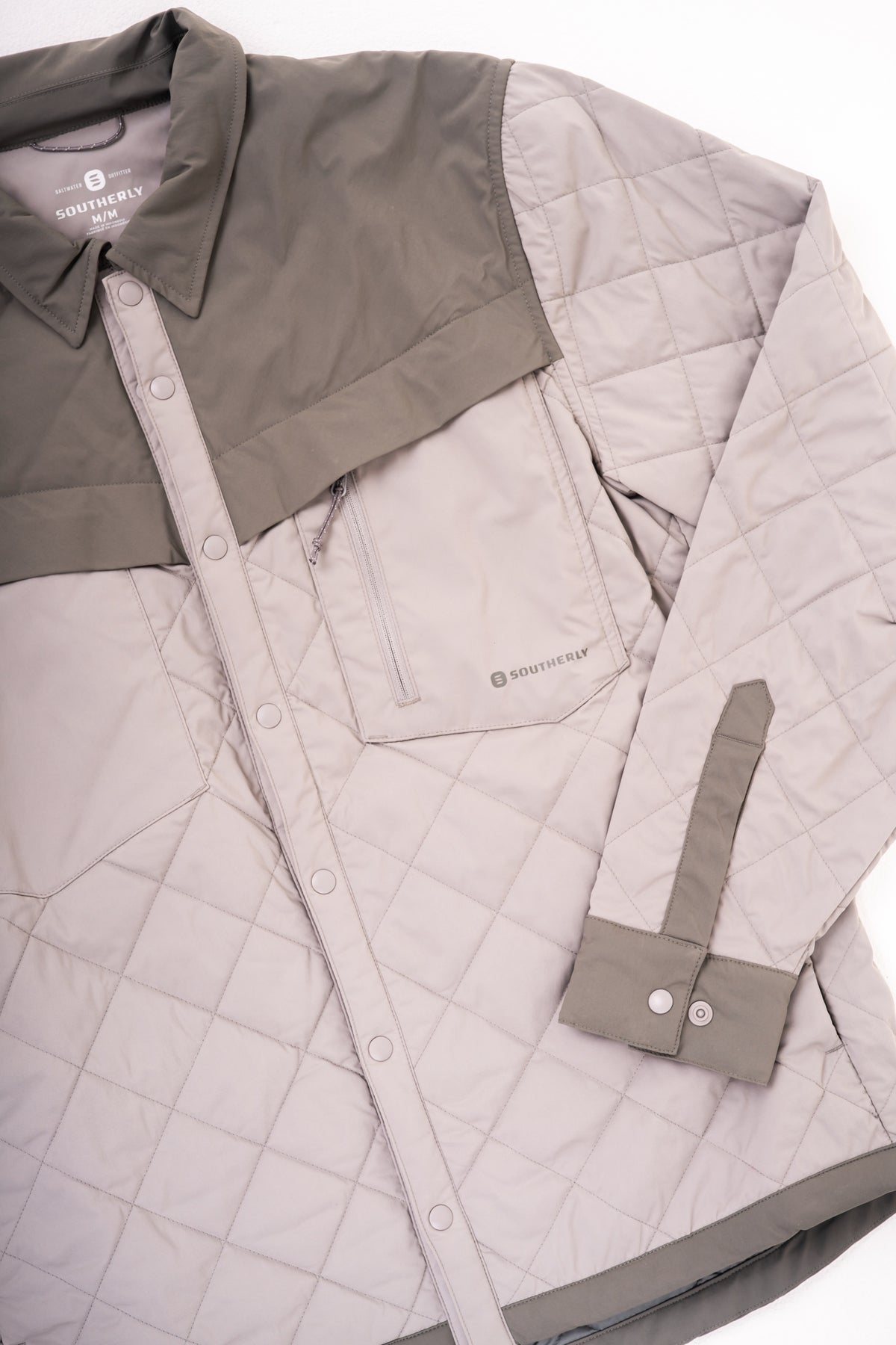 Men's Jetty Insulated Shirt in Stainless, flat studio detail of quilted front and cuff