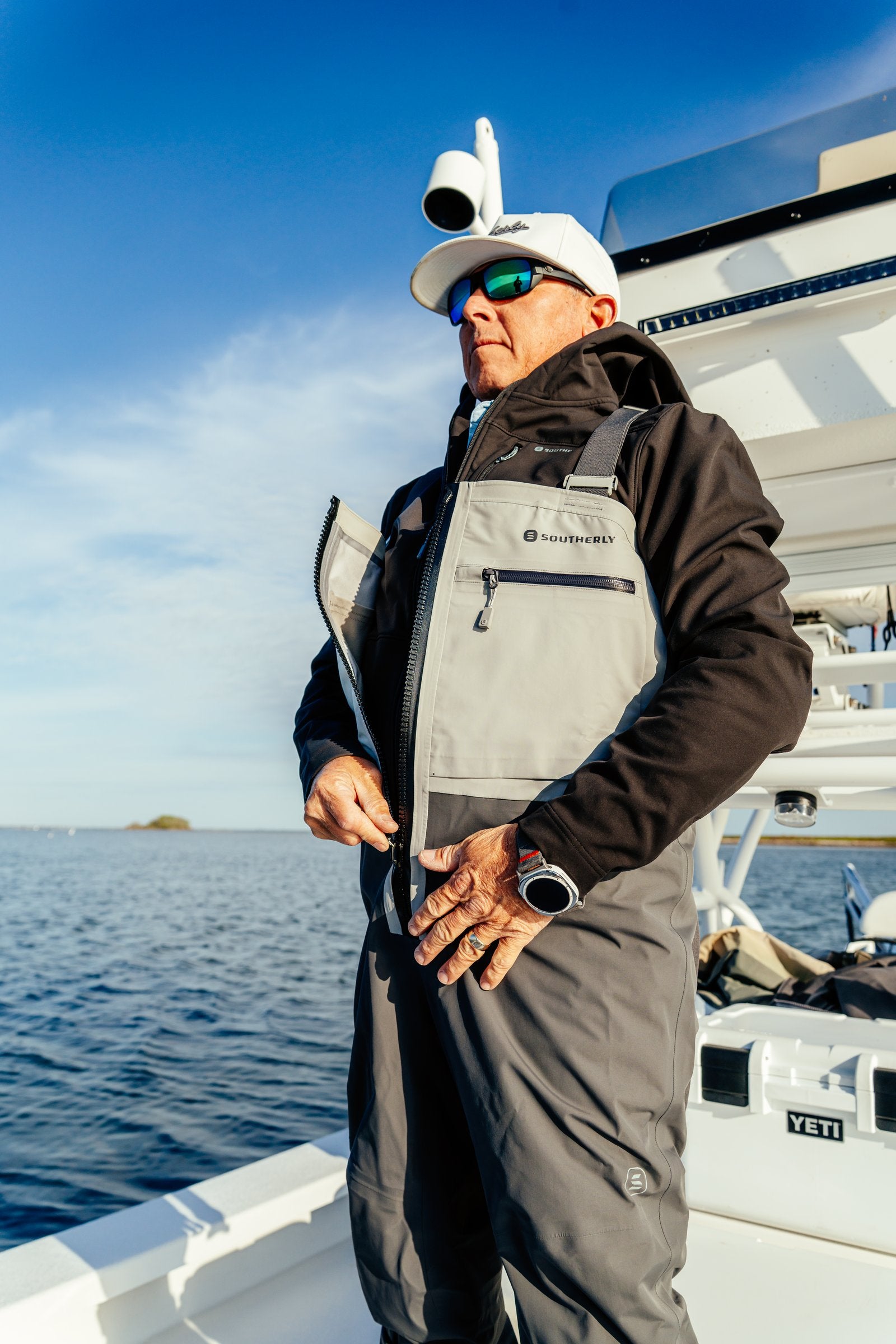 Breakwater Wader in Tempest — adjusting the harness on deck