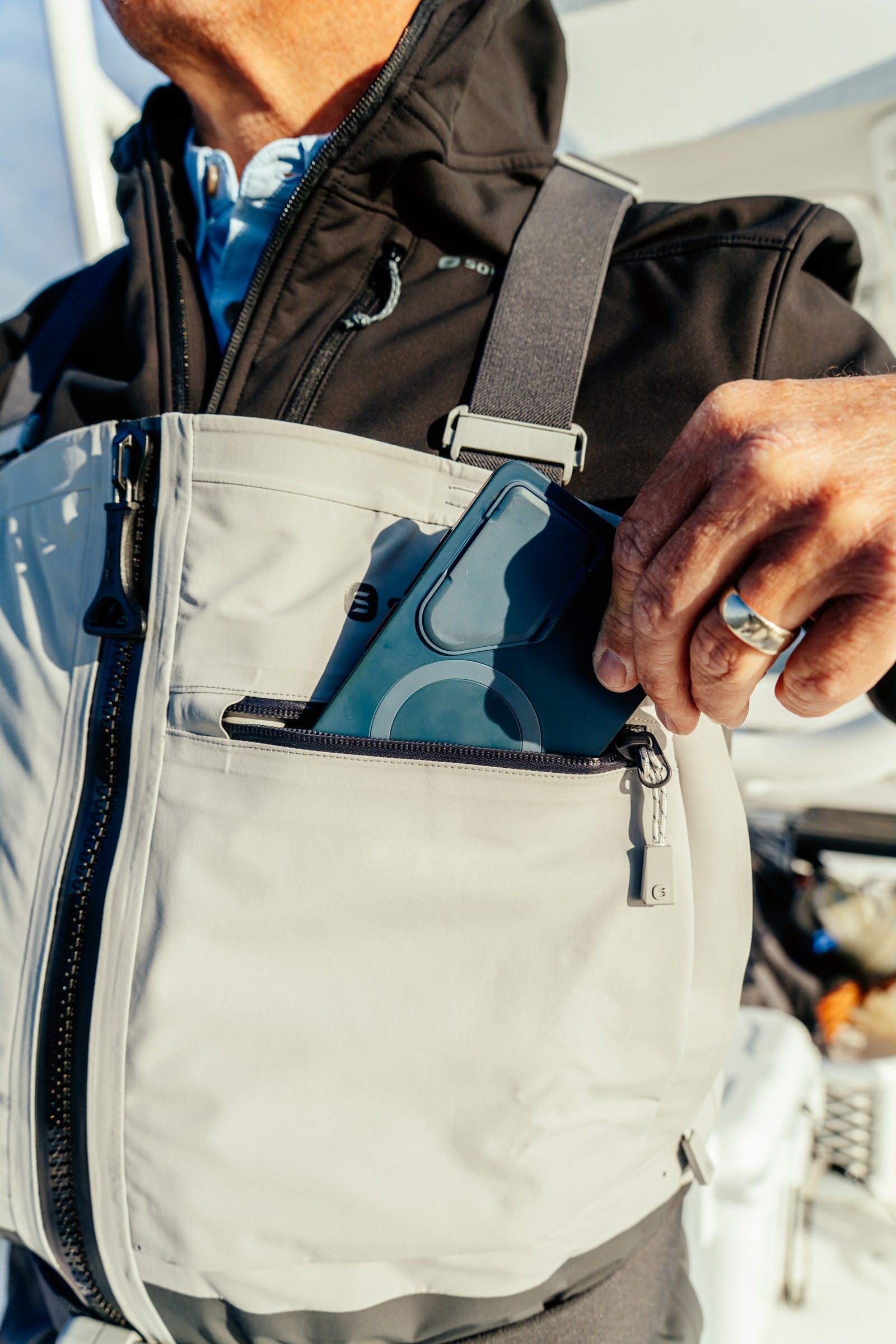 Breakwater Wader — phone in the water-resistant chest pocket