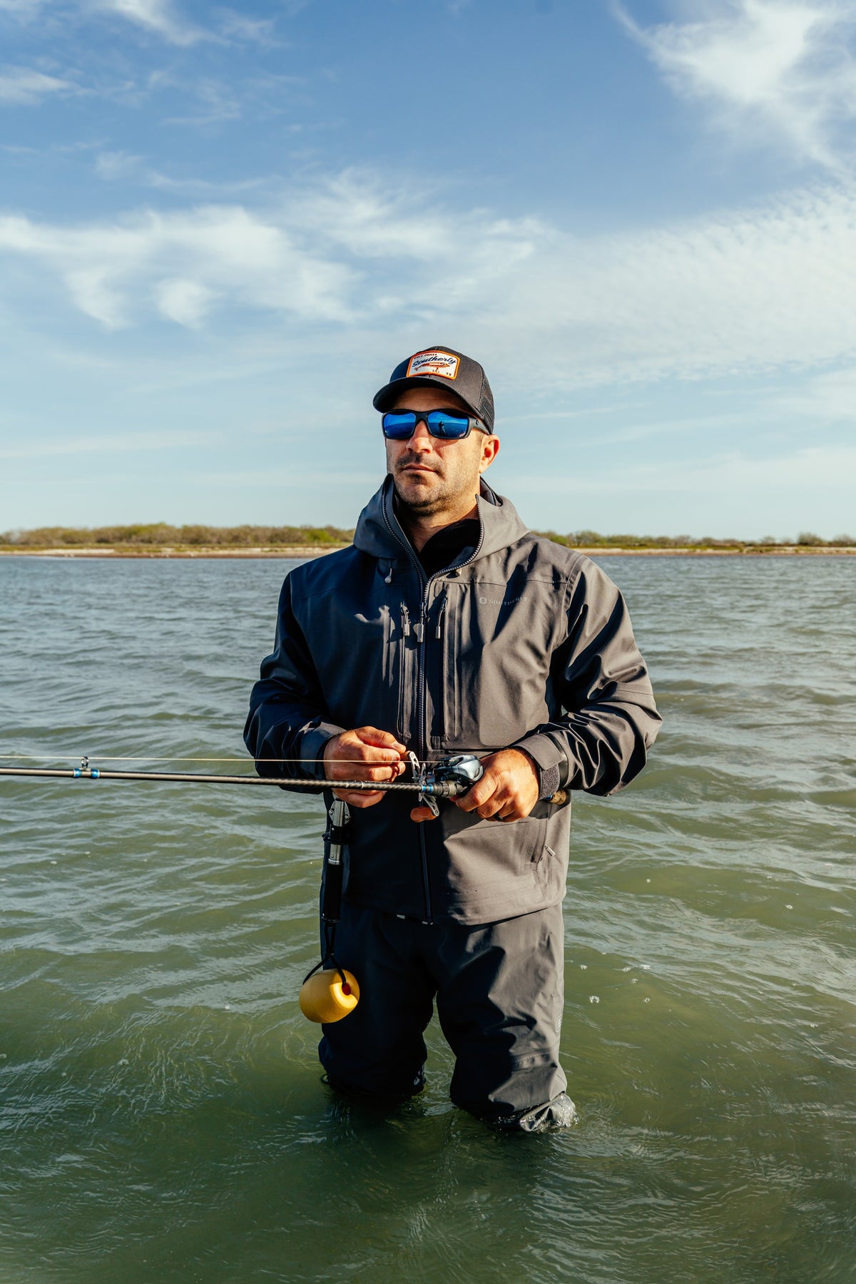 Men's HD Coastal Fishing Jacket in Tempest, wading the flats