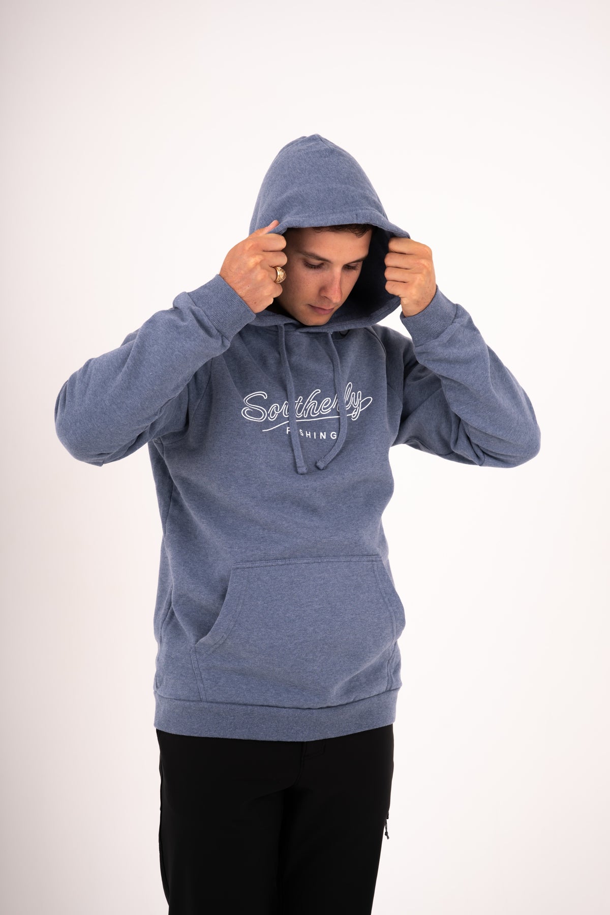Southerly Script Hoody in Flint Blue, studio view with hood up