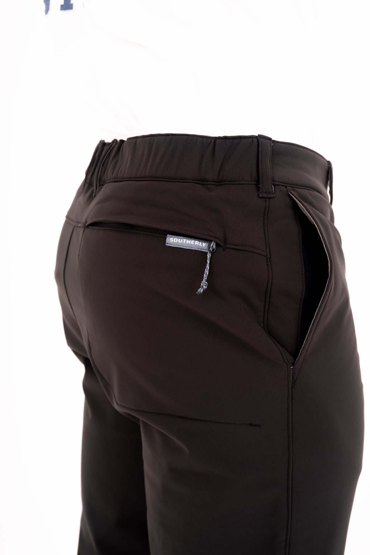 Windward Thermal Pant in Black — zippered rear pocket detail